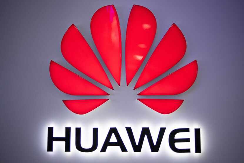 In this photo taken on May 27, 2019, a Huawei logo is displayed at a retail store in...