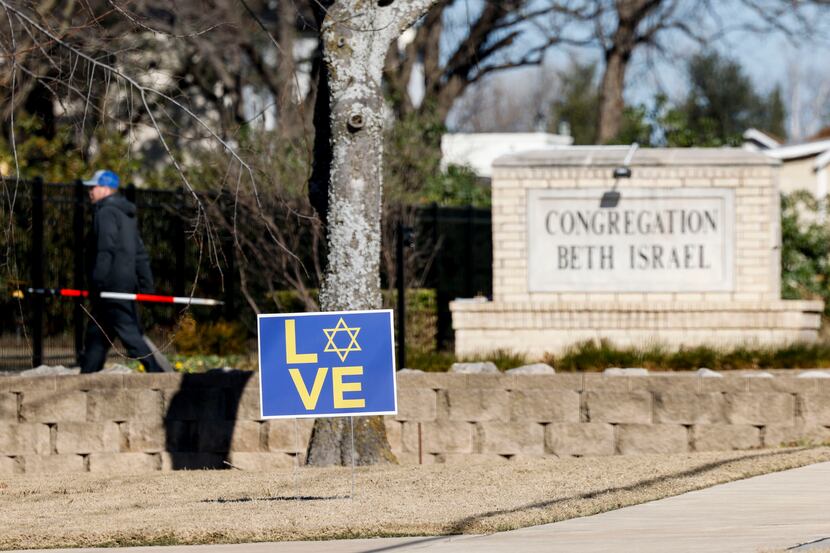 A glimpse of the scene outside of Congregation Beth Israel synagogue on Sunday, Jan. 17,...