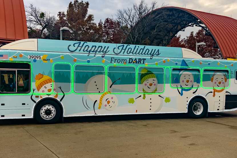Exterior of DART holiday bus parked outside of a stop