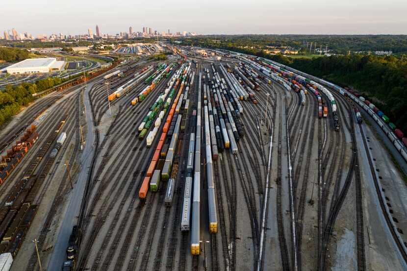 Freight train cars sit in a Norfolk Southern rail yard on Sept. 14, 2022, in Atlanta....