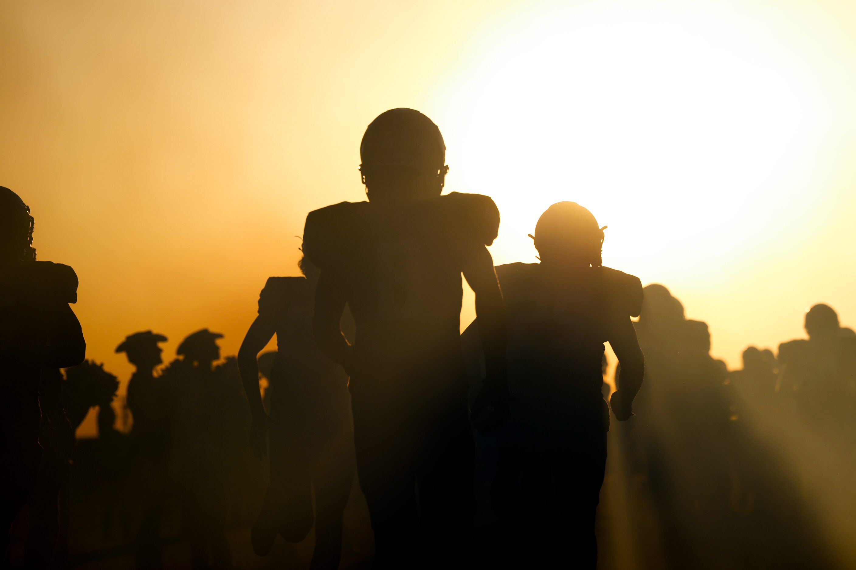 The Frisco Independence Knights hit the field before the start of their District 3-5A...