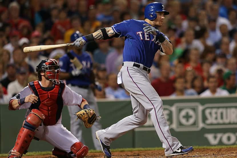 BOSTON, MA - AUGUST 7: Josh Hamilton #32 of the Texas Rangers knocks in a run in the sixth...