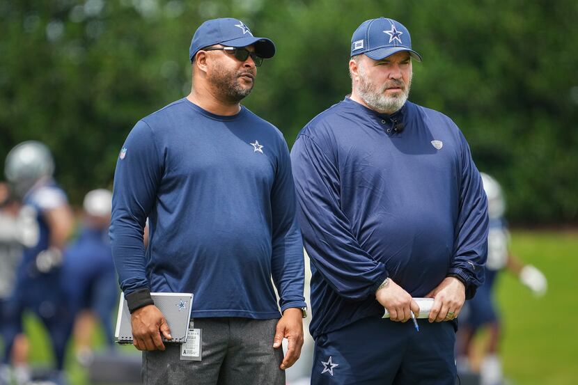 Dallas Cowboys head coach Mike McCarthy (right) and vice president of player personnel Will...