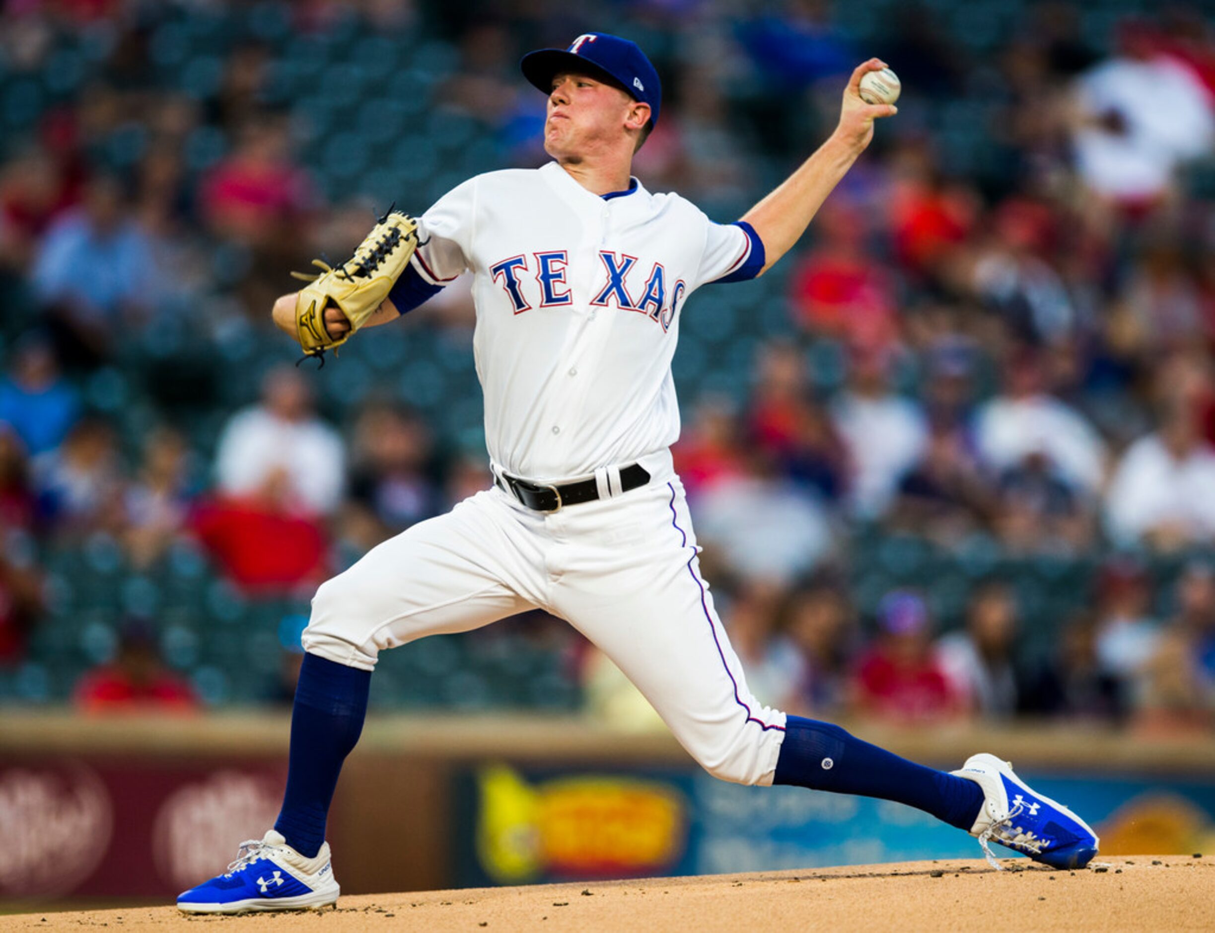 Texas Rangers starting pitcher Kolby Allard (39) pitches during the first inning of an MLB...