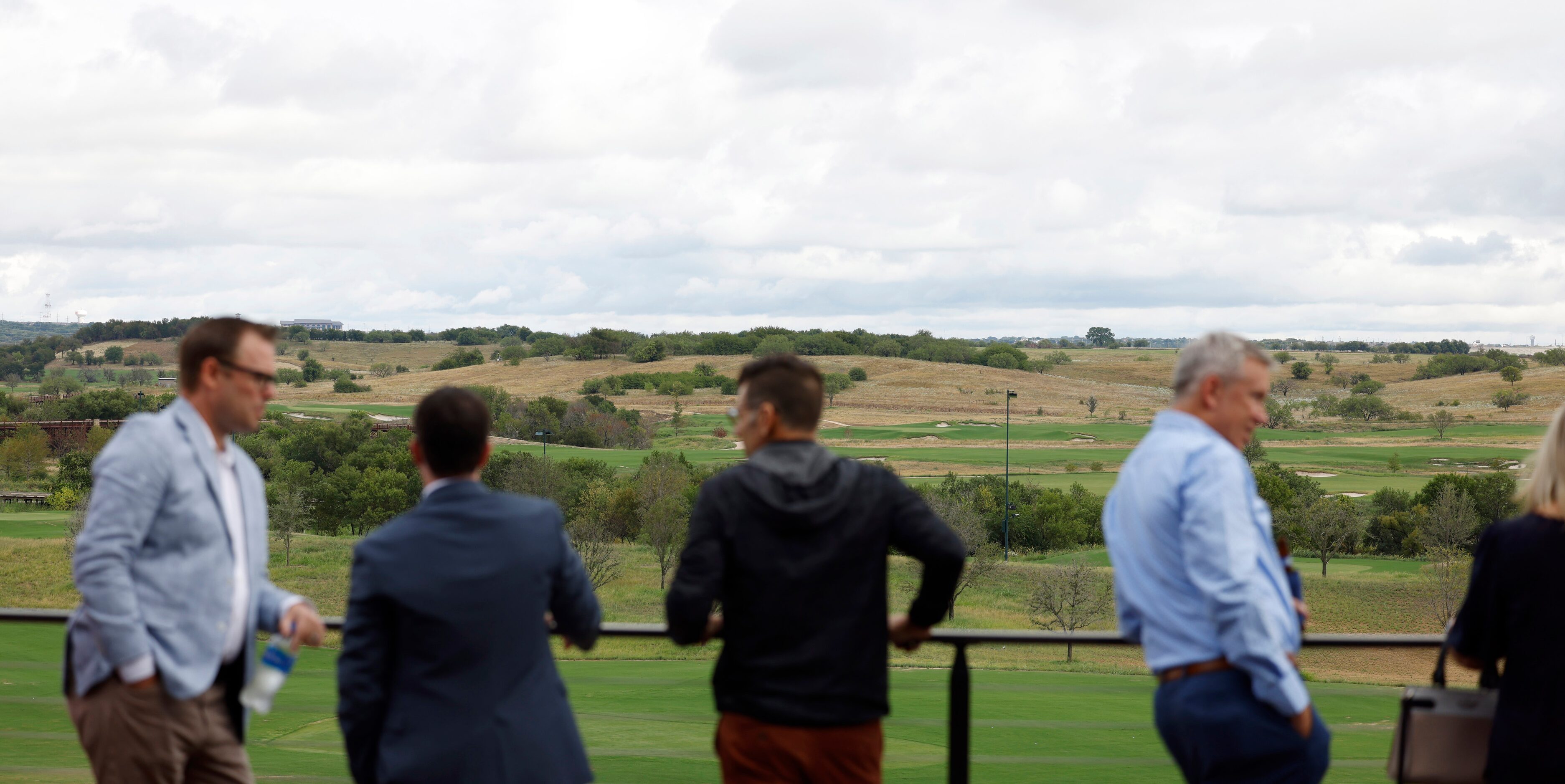 People enjoy the view of the facility from the fourth floor of the PGA of America...