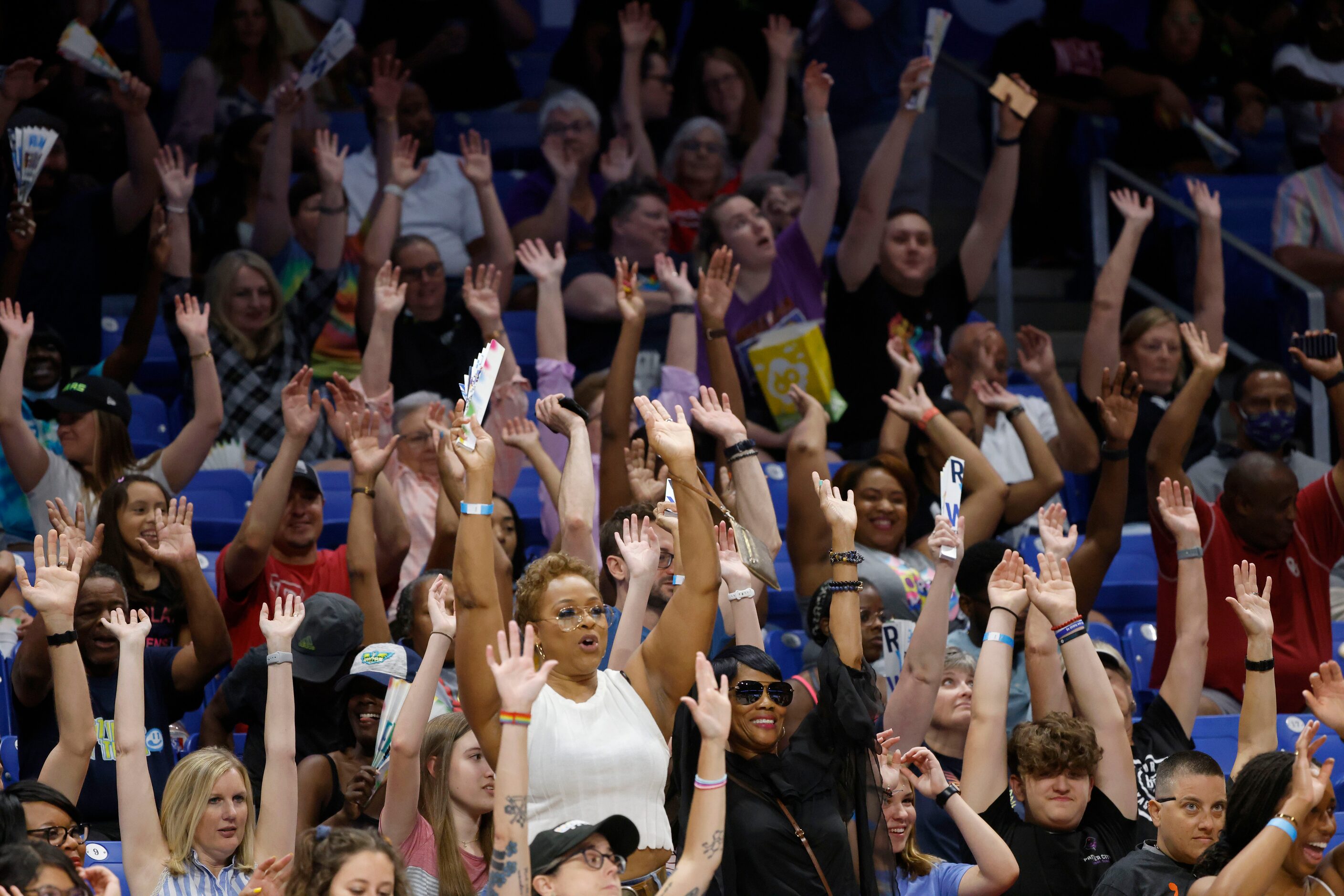 Dallas Wings fans do “the wave” during the second half of a WNBA basketball game in...