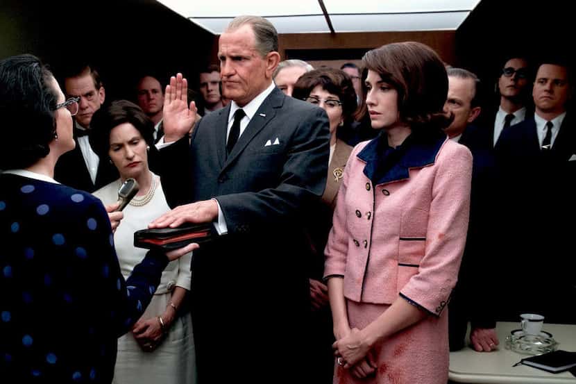 Woody Harrelson's Lyndon Baines Johnson is sworn in as president in "LBJ."