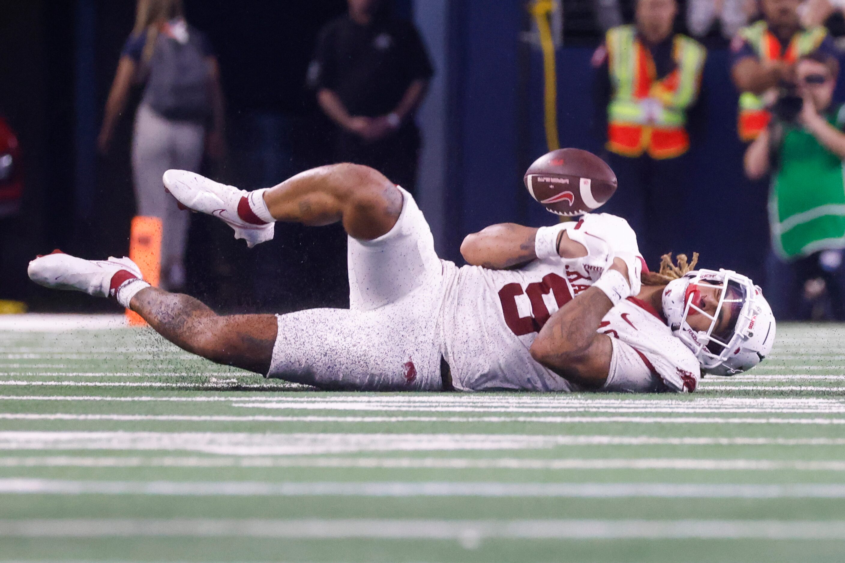 Arkansas wide receiver Jadon Haselwood (9) reacts as he misses to receive a pass against...