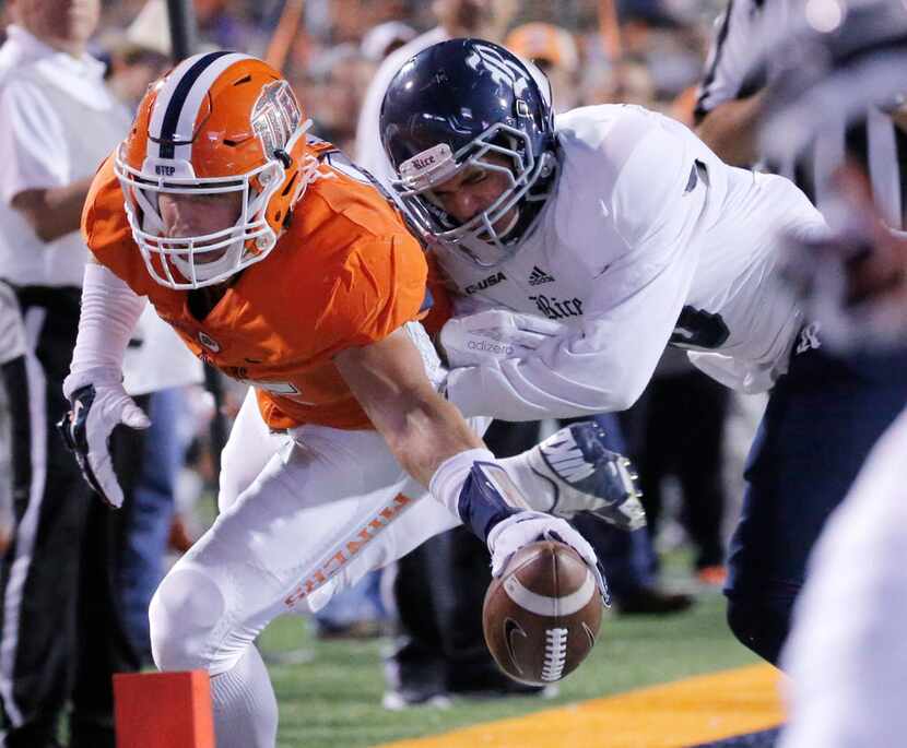 Rice safety JP Thompson keeps UTEP tight end Hayden Plinke out of the end zone during the...