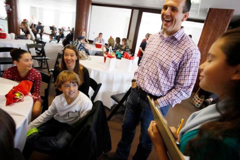 
ALAKINA TRAHAN, 10, right, interviews patient James Altizer, center, and his family —...