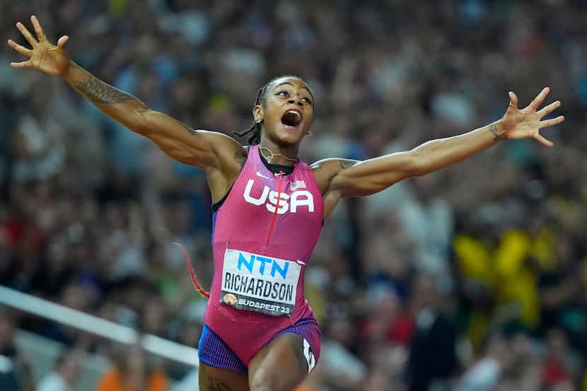 FILE - Sha'Carri Richardson, of the United States, celebrates after winning the gold medal...