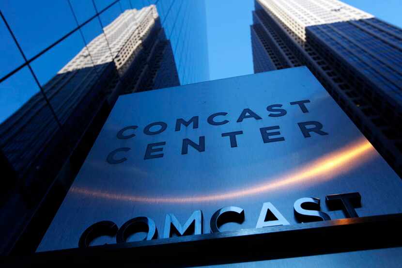 FILE - In this Dec. 3, 2009 file photo, a sign outside the Comcast Center is seen in...