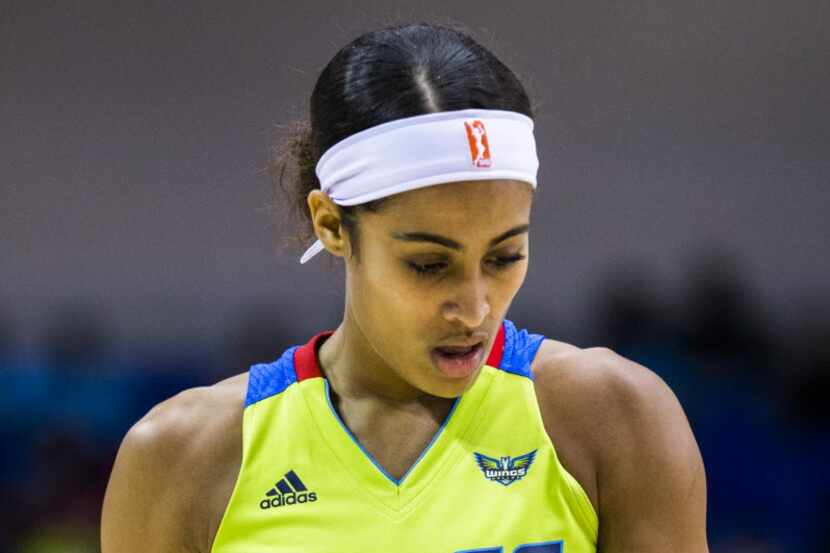 Dallas Wings guard Skylar Diggins (4) reacts to a call during the third quarter of their...