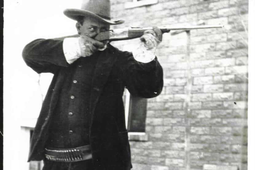 
Frank Hamer in action. His rifle is a Savage Model 1899. From Texas Ranger, by John...