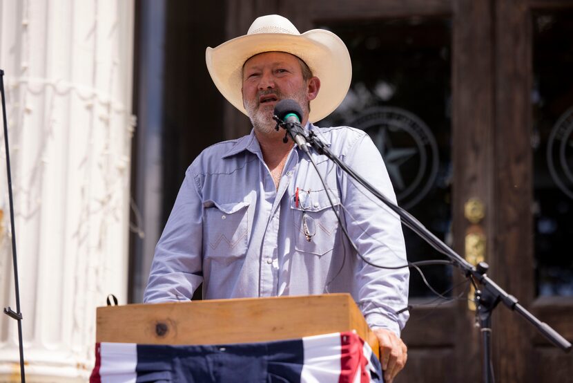 Lloyd Lane, Freestone County Commissioner, speaks during a news conference outside the...