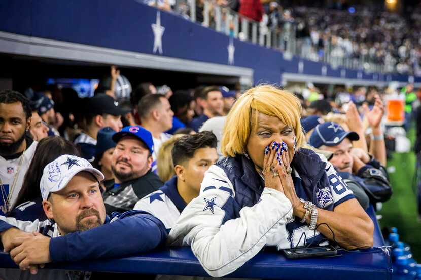 Dallas Cowboys fan Carolyn Price reacts after the  Green Bay Packers kicked a 51-yard...