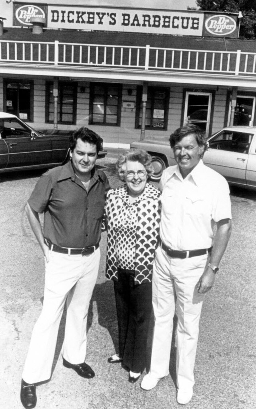 Roland Dickey (left) and Travis "TD" Dickey Jr. stood with their mother, Ollie Dickey, in...