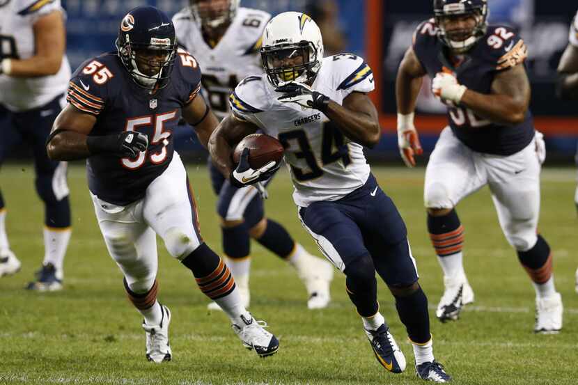 San Diego Chargers running back Fozzy Whittaker (34) runs against Chicago Bears outside...