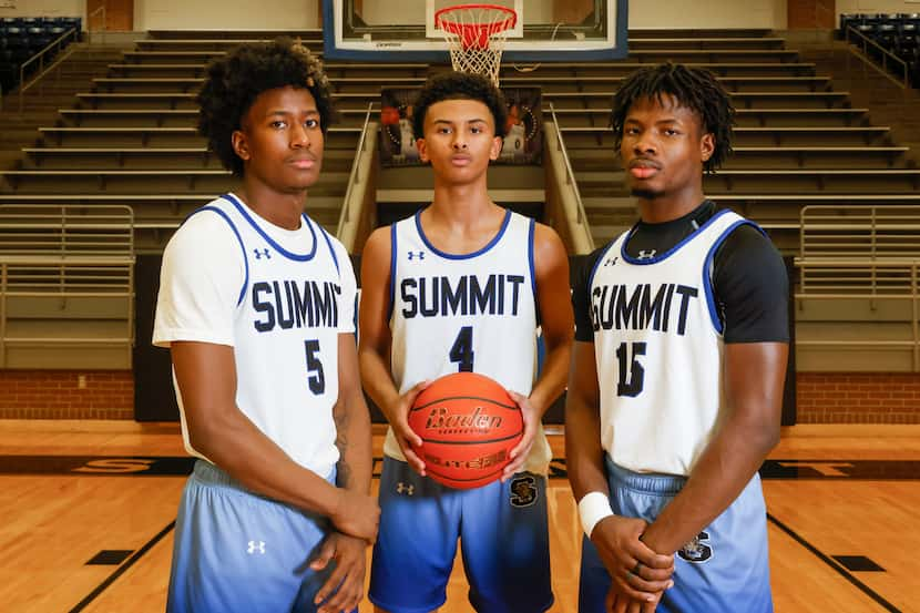 Mansfield Summit seniors David Terrell (from left), Franck Emmou and Richard Lemboye stand...