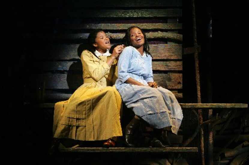 Renee Elise Goldsberry, left, as Nettie and LaChanze as Celie in the musical 'The Color...