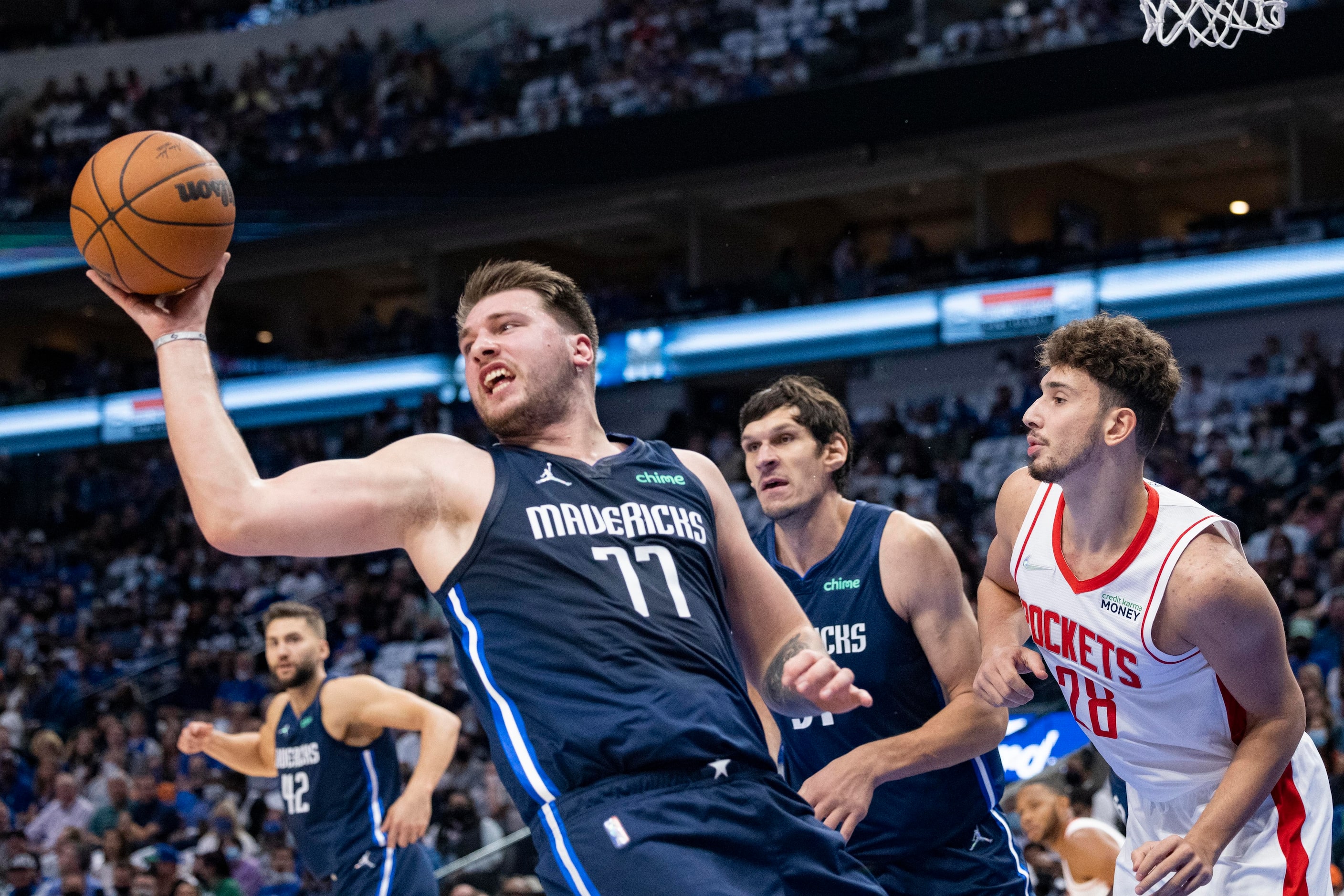 Dallas Mavericks guard Luka Dončić (77) catches the rebound during the first quarter of the...