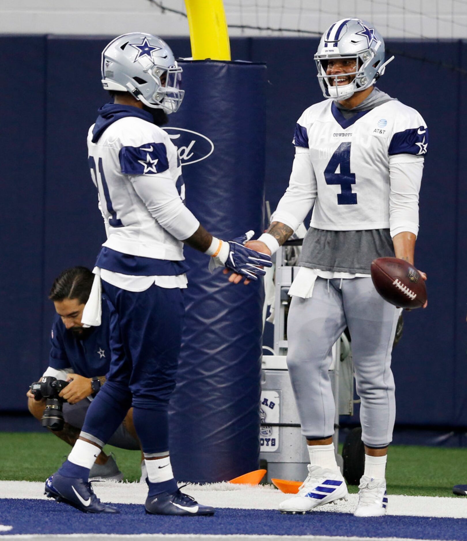 Dallas Cowboys running back Ezekiel Elliott (21) and Dallas Cowboys quarterback Dak Prescott...