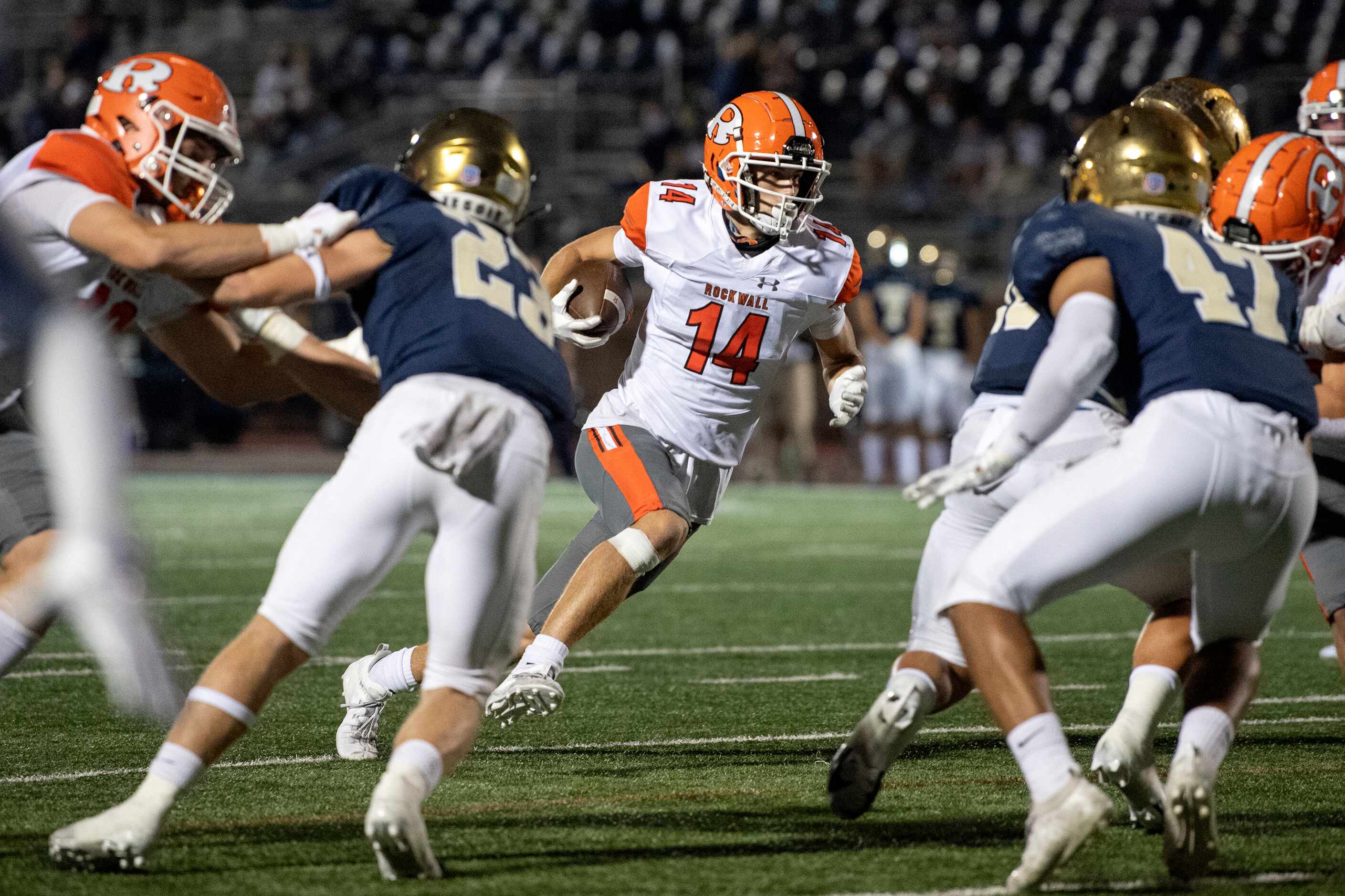 Rockwall junior wide receiver Caden Marshall (14) runs for a touchdown against Jesuit in the...