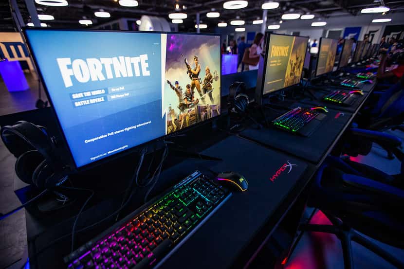 This file photo shows Fortnite loaded onto gaming computers during an open house at the Mavs...