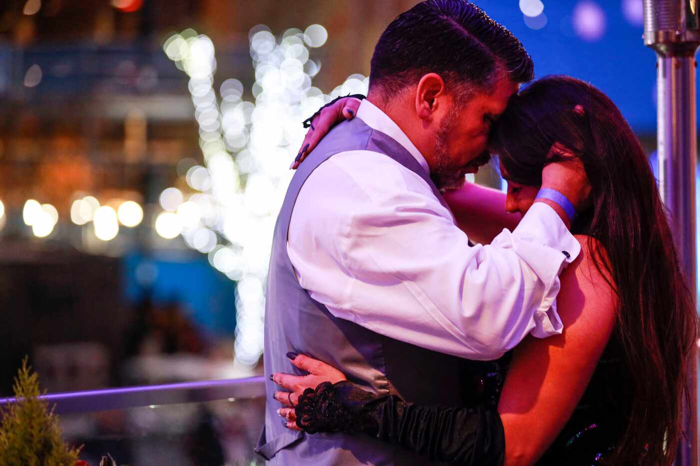 Richard and Jamie Mendoza share a moment together on New Years at The Exchange in Dallas,...