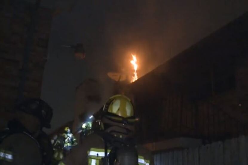 Dallas firefighters fought a blaze that broke out in a condominium complex Tuesday morning...