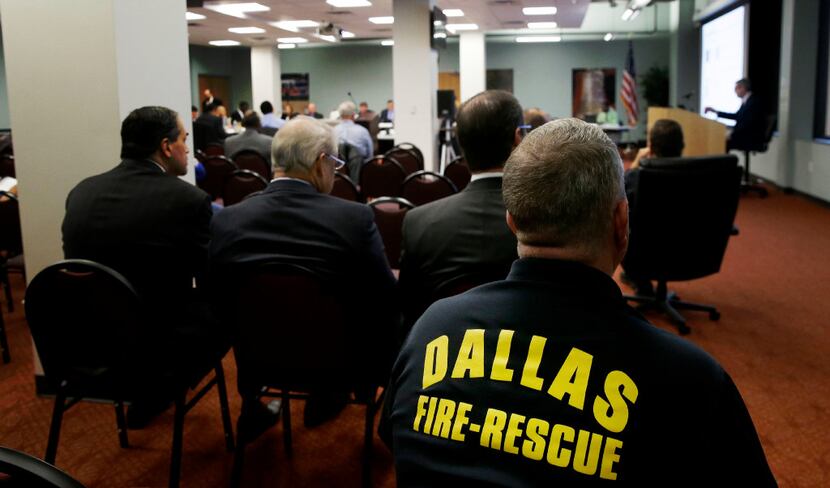 People sit in the gallery as the Dallas Police & Fire Pension System board of trustees meet...