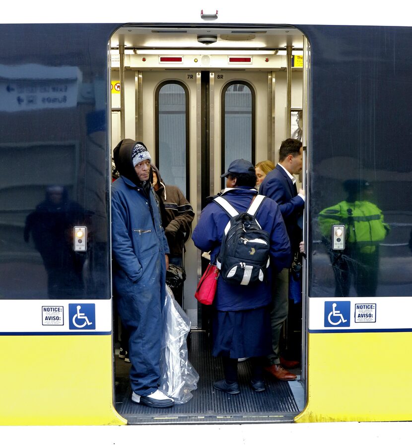 Passengers wait for DART train service at Mockingbird Station in Dallas, Texas. Problems...