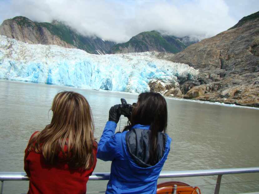 Oosterdam passengers on an excursion from Juneau get a close look at South Sawyer Glacier,...