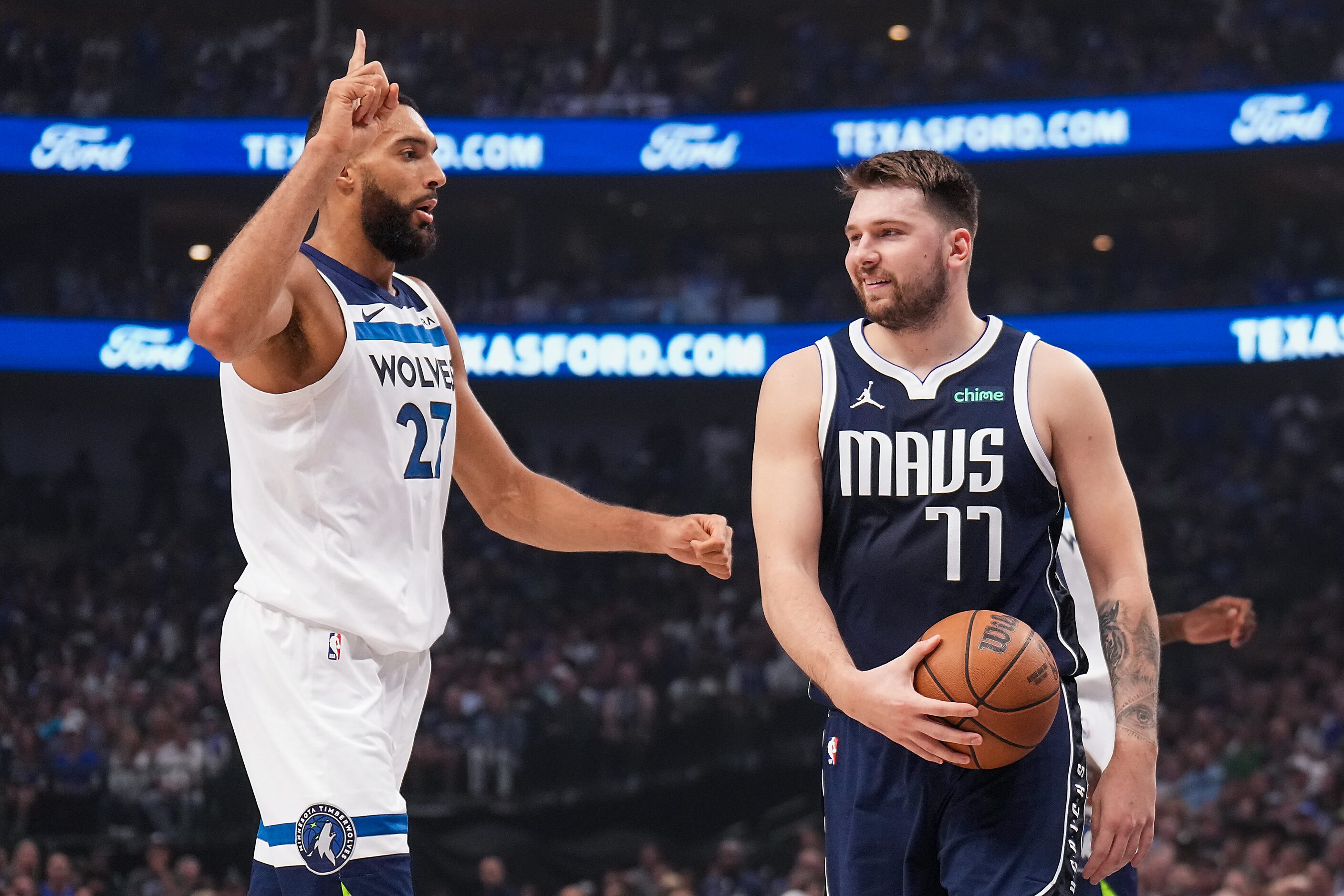 Dallas Mavericks guard Luka Doncic (77) reacts after being fouled by Minnesota Timberwolves...