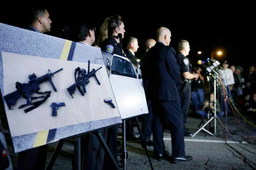 
Police crime photos, including one showing the weapons used by the San Bernardino...