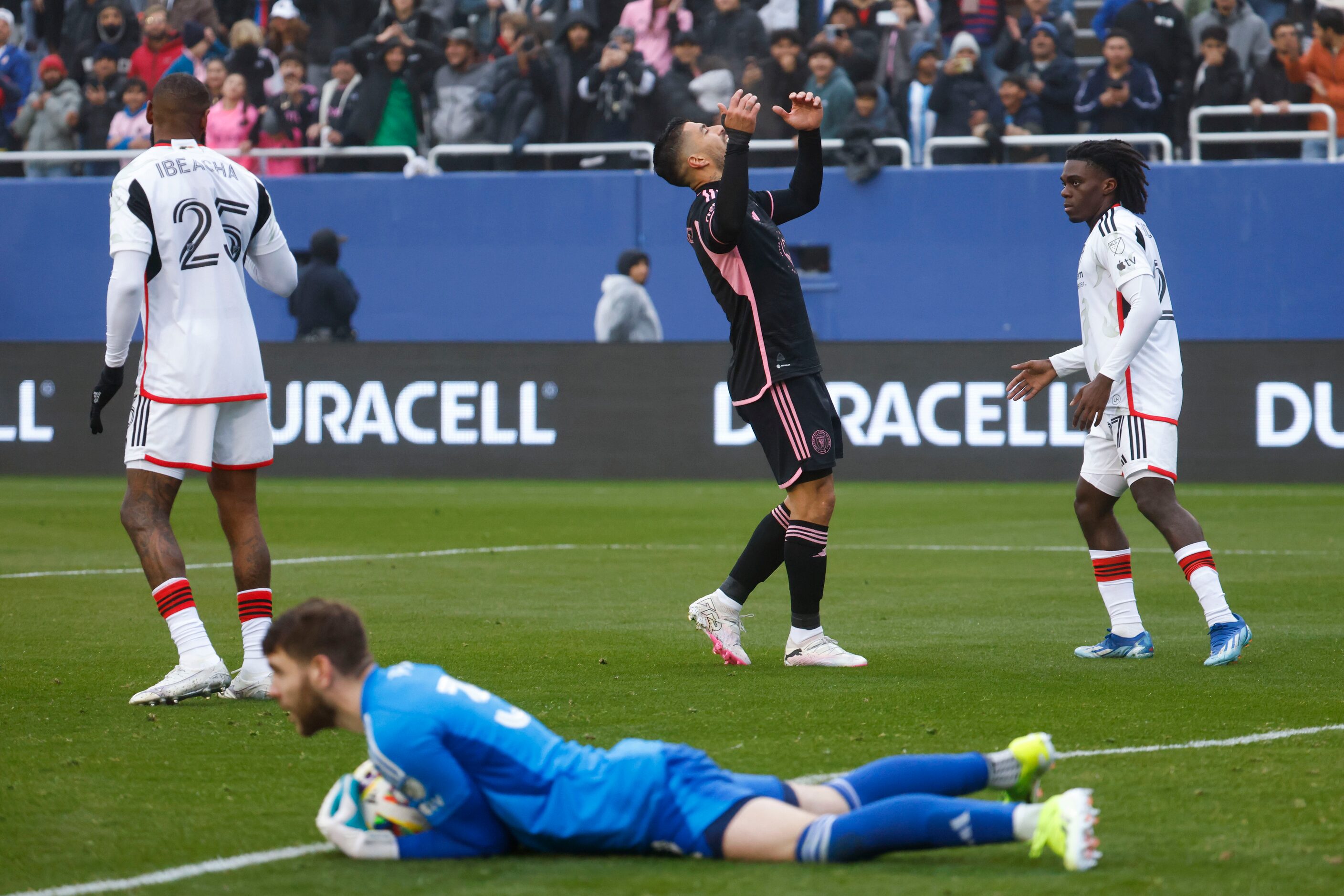 Inter Miami forward Luis Suárez (back center) reacts after missing a goal during the first...