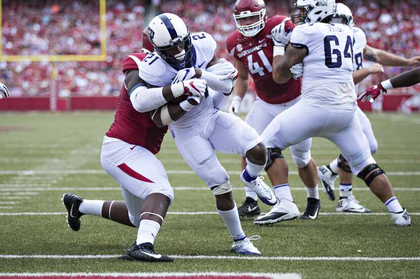 FAYETTEVILLE, AR - SEPTEMBER 9:  Kyle Hicks #21 of the TCU Horned Frogs runs the ball in for...