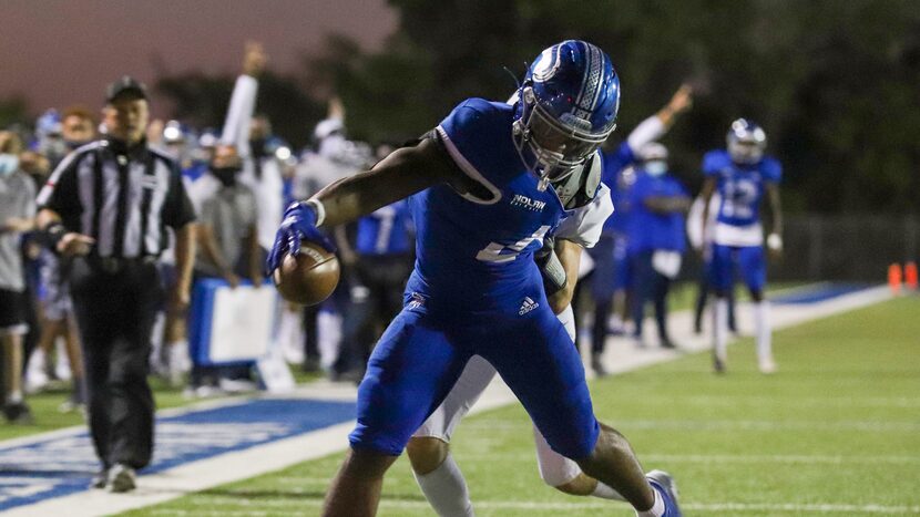 Fort Worth Nolan running back Emeka Megwa (6) reaches for the goal line as Fort Worth All...