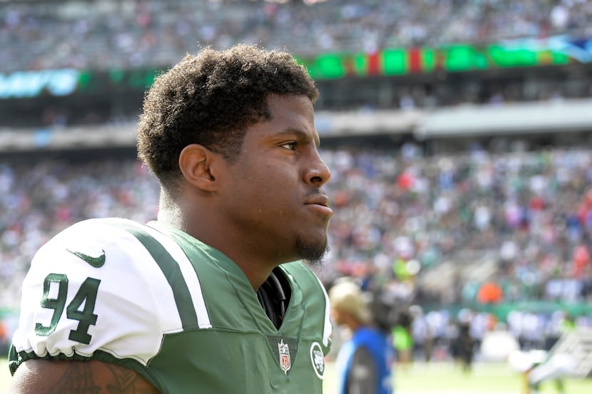 New York Jets outside linebacker Kony Ealy (94) looks on before an NFL football game against...