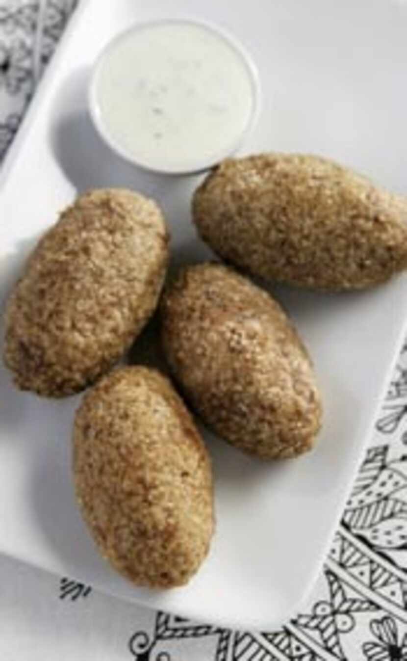  Serve kibbeh (bulgur-and-meat balls) baked or fried with cucumber sauce. 