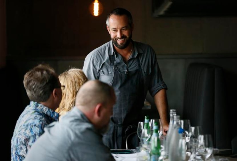 
Chef-owner Jon Stevens talks with diners at Stock and Barrel.
