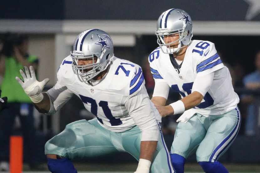 Dallas Cowboys offensive guard La'el Collins (71) and quarterback Matt Cassel (16) are...