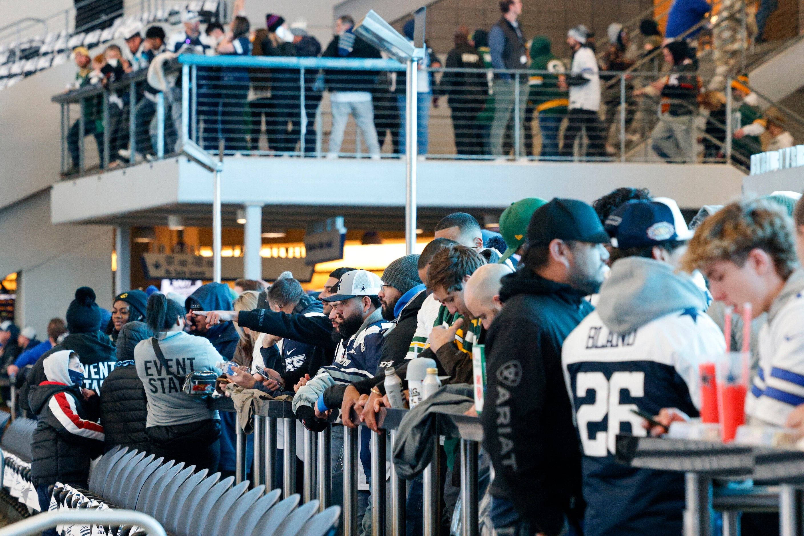 Fans gather in a standing room only section before an NFL wild card playoff game between the...