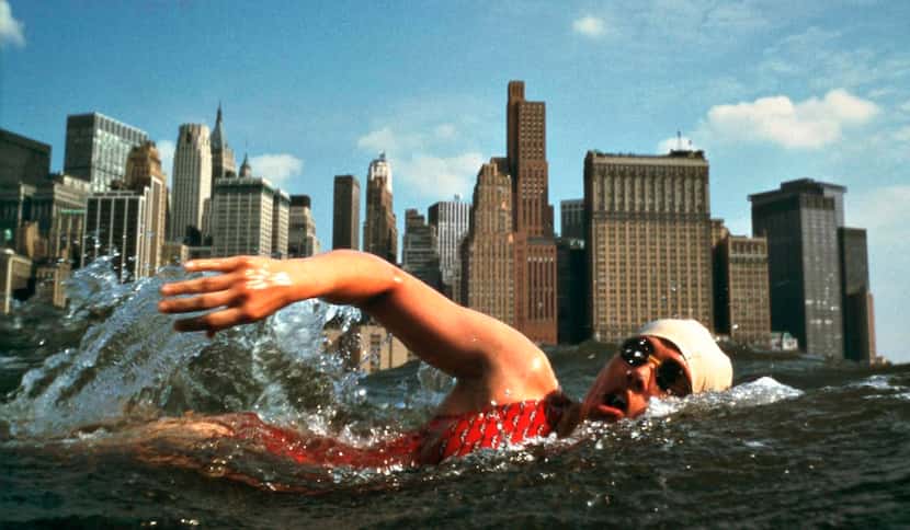 
Diana Nyad breaking the 48-year-old record for circling Manhattan Island in 1975. She did...