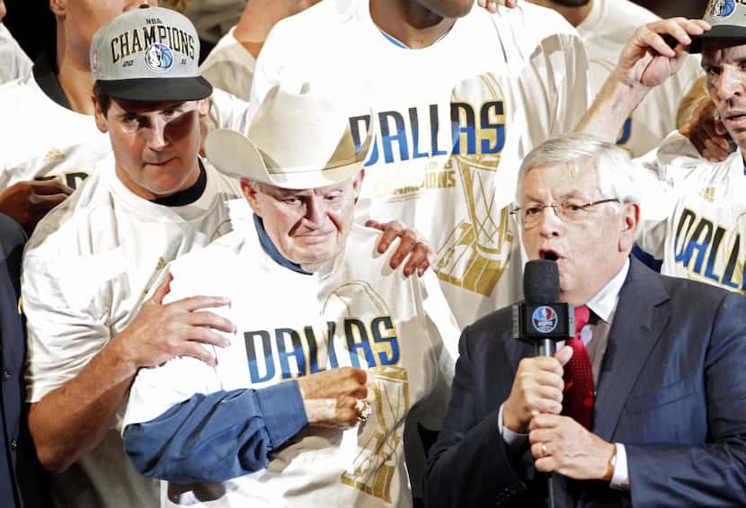 Dallas Mavericks original owner Don Carter (in cowboy hat) gets emotional before getting the...