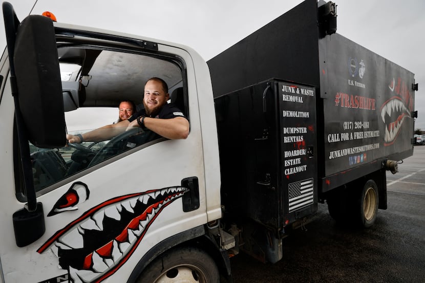 U.S. Marine Corps veterans Bryant Griffith, owner of Junk and Waste Solutions, JAWS,...