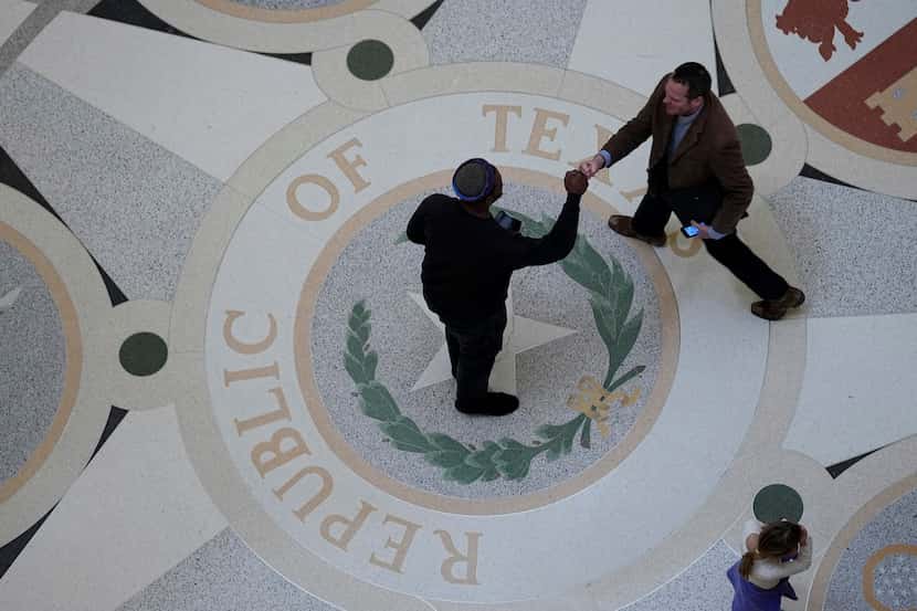 Visitors walk through the Texas Capitol rotunda in Austin, Texas, Monday, Jan. 9, 2023. The...