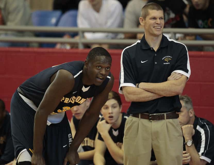 Prestonwood's Julius Randle (30) talks to coach Chris Mayberry as they played Madison Prep...
