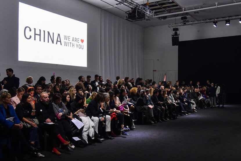 Guests waited for the start of the "China, We are With You" fashion show from Chinese...