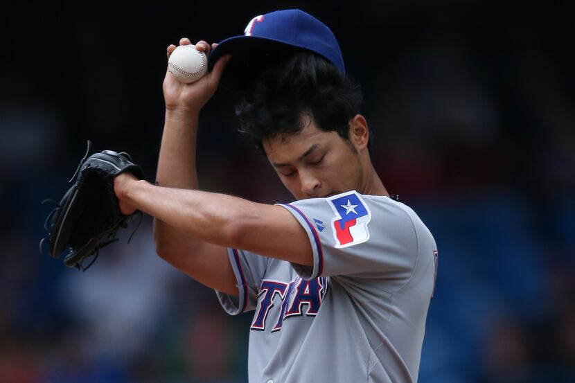 Yu Darvish (11) of the Texas Rangers during MLB game action against the Toronto Blue Jays on...